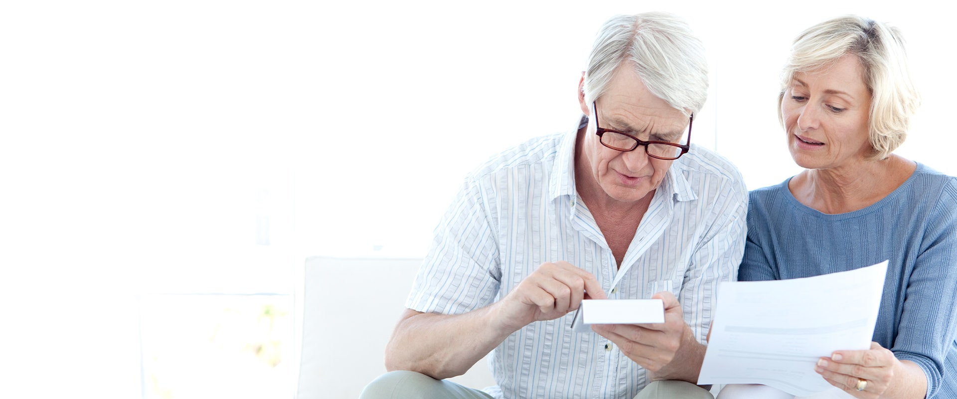 Senior adults doing finances